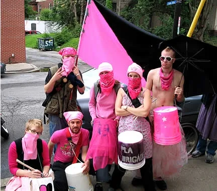 A group of marchers with buckets at the 2003 Pittsburgh Gay Pride parade.