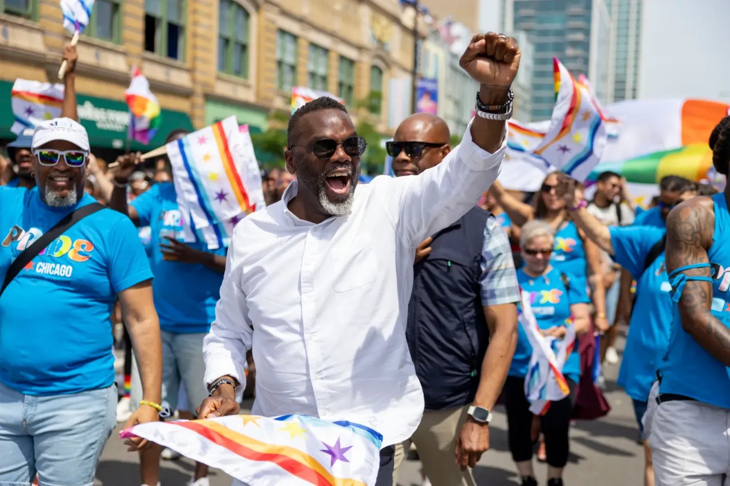 Mayor Brandon Johnson marches in the 55th annual Chicago Pride Parade holding a Chicago Pride Flag, June 28, 2026, in the Lakeview neighborhood