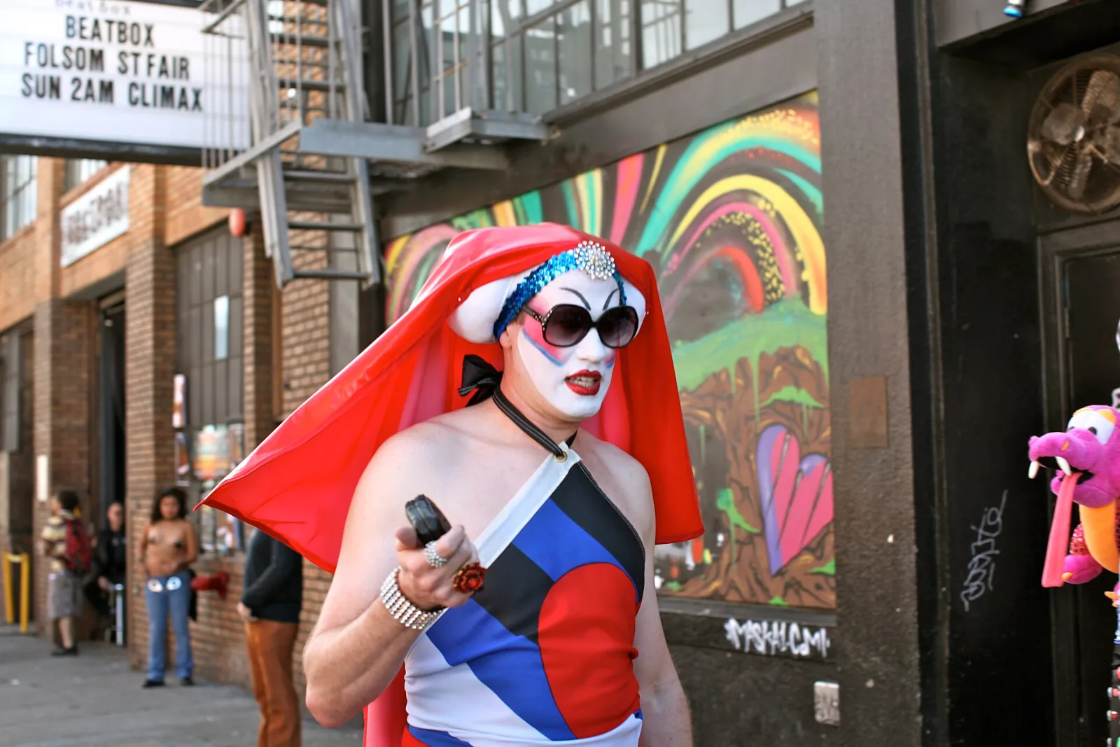 A Sister of Perpetual Indulgence at the Folsom Street Fair in San Francisco, wearing a Leather Pride Flag.