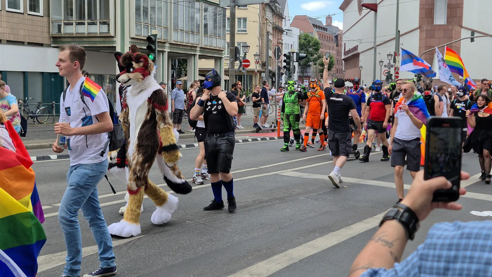 A Puppy Pride Flag among marchers at Christopher Street Day in Frankfurt.