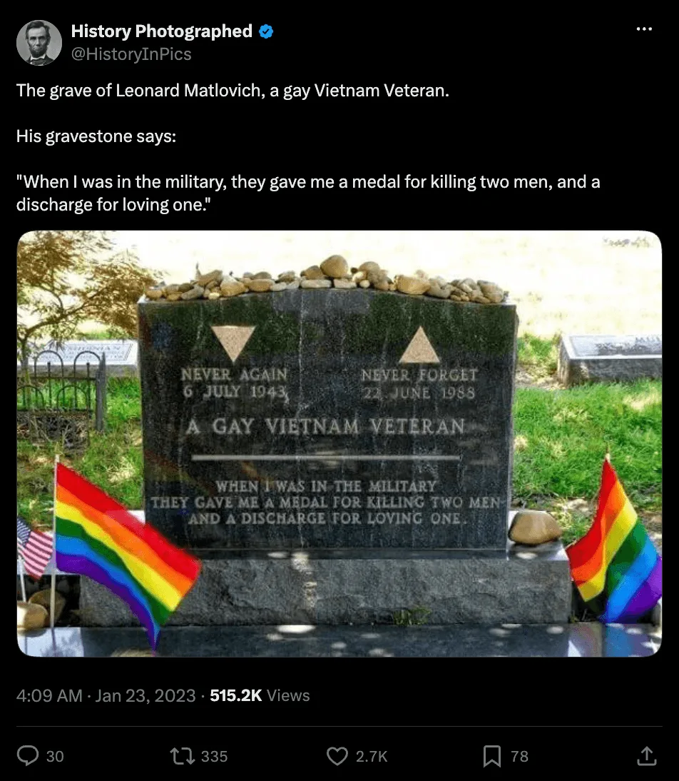 Screenshot of a post by the verified account History Photographed (@HistoryInPics) reading 'The grave of Leonard Matlovich, a gay Vietnam Veteran' and quoting the epitaph, above a photograph of the headstone with two rainbow flags and a small United States flag at its base and stones left along its top. Below the post: 515.2K views, 30 replies, 335 reposts, 2,700 likes, 78 bookmarks.