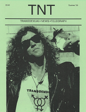 The front cover of TNT: Transsexual News Telegraph, Summer 1993, printed in green and black. A person in sunglasses, long hair and a leather jacket faces the camera. Their light T-shirt reads TRANSGEND in black capitals, the word running off the edge of the frame, above a downward-pointing triangle containing interlocked circles with an arrow to the upper left, a cross to the upper right, a cross at the lower left, and an arrow pointing down.