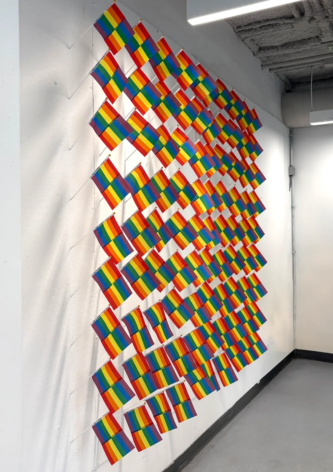Right to Assemble — the mini Pride flags installation from the opposite angle